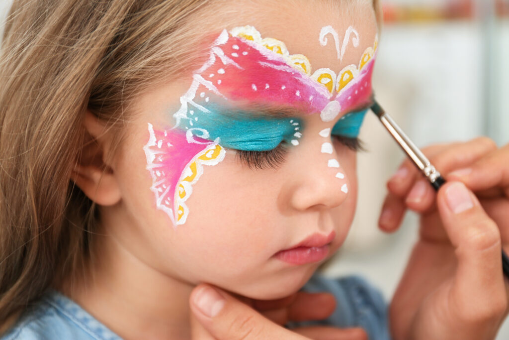 child being face painted