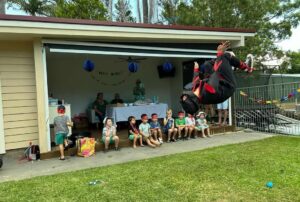 Ninja entertainer in mid air doing a backflip